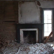 Taking plaster down in upstairs bedroom